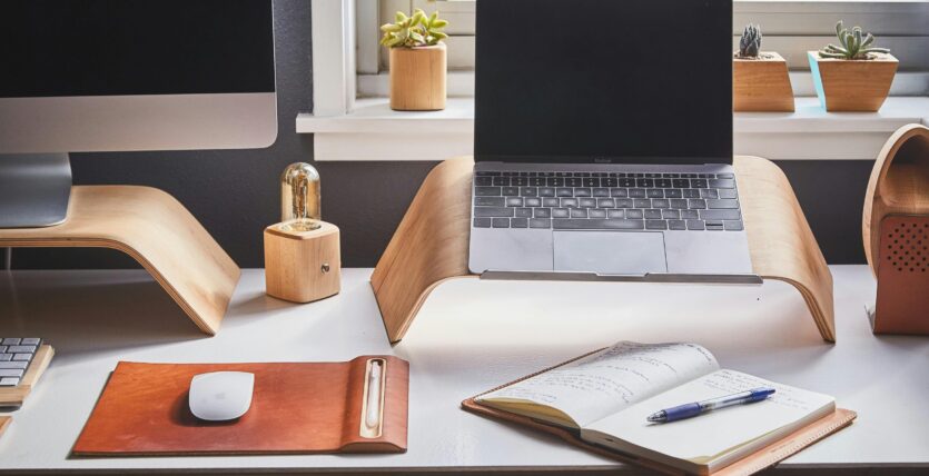 Free A stylish and contemporary home office setup with laptop and desk accessories. Stock Photo